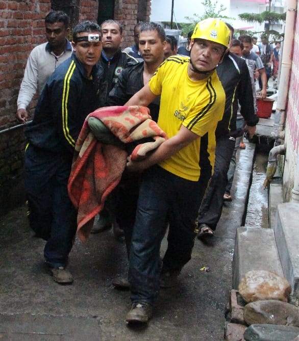 Father crying after see his sons situation during house collapse 