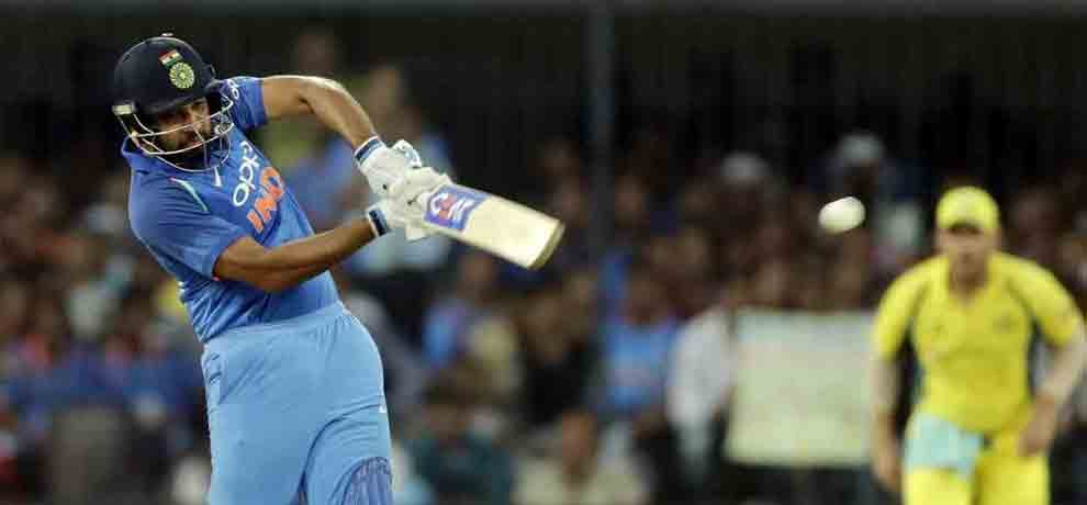 rohit sharma sends ball outside the stadium off kane richardson delivery 