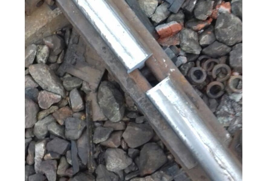 Trains run through broken lines in Uttar Pradesh.