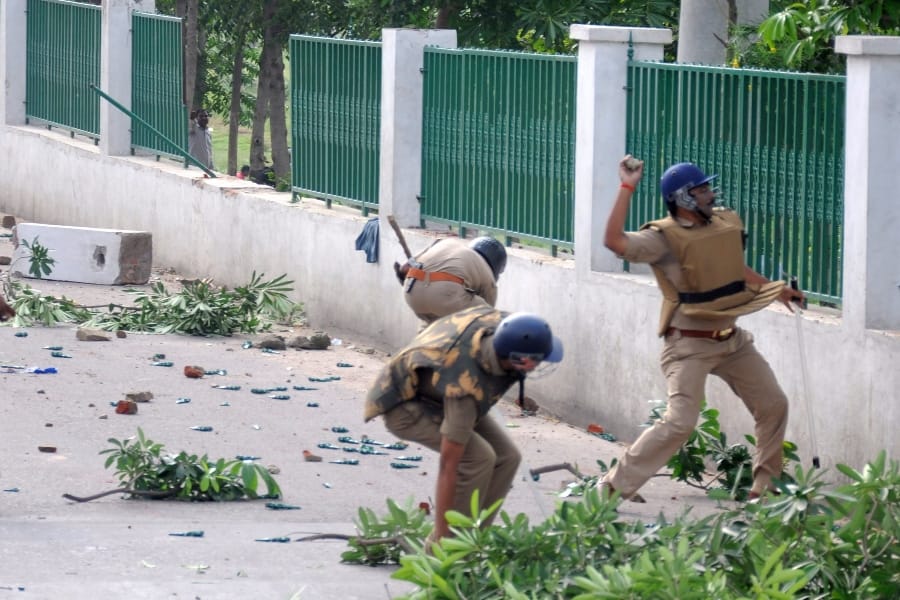 stone pelting from gram rojgar sevak on police force