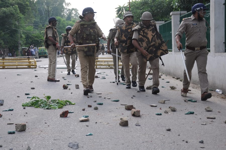 stone pelting from gram rojgar sevak on police force