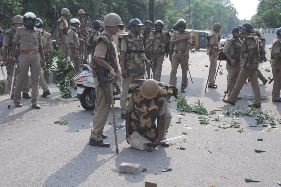 stone pelting from gram rojgar sevak on police force