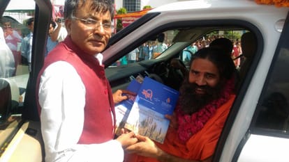 why adanis works with foreigners asks baba ramdev 