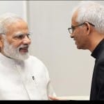 मोदी फादर टॉम के साथ