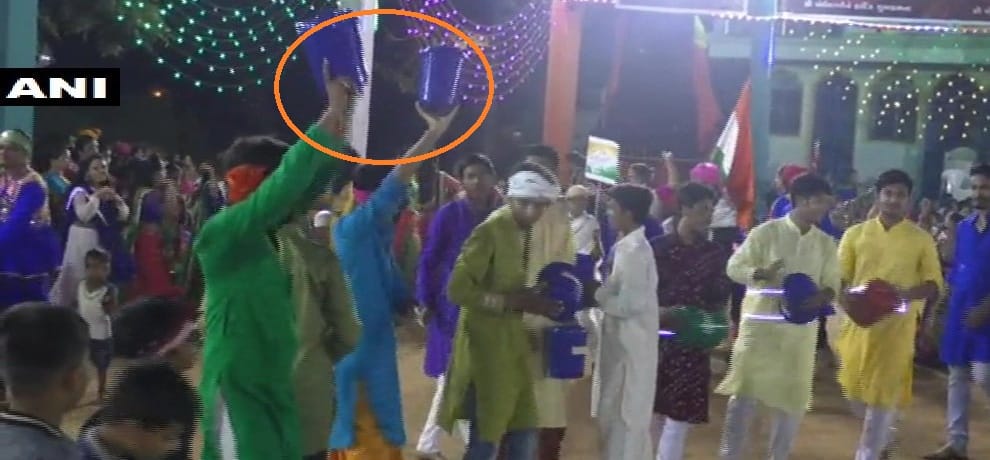 gujrat Vadodara people doing garba holding dustbins for cleanliness message