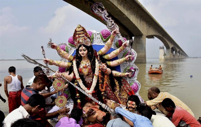 see in pictures maa Durga Statue immersion and sindur holi