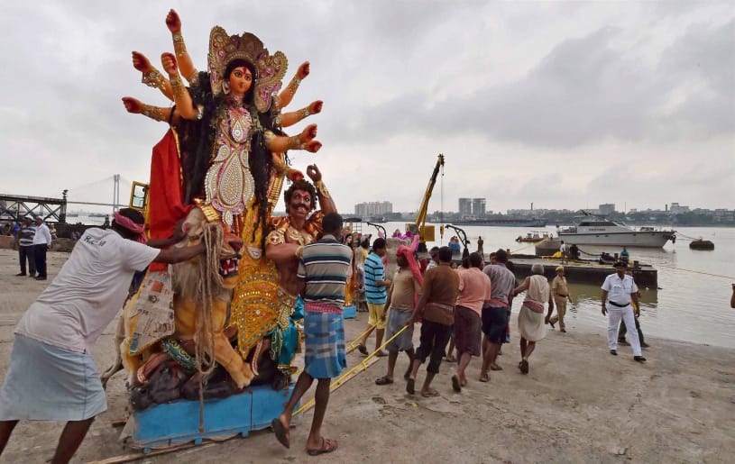 see in pictures maa Durga Statue immersion and sindur holi