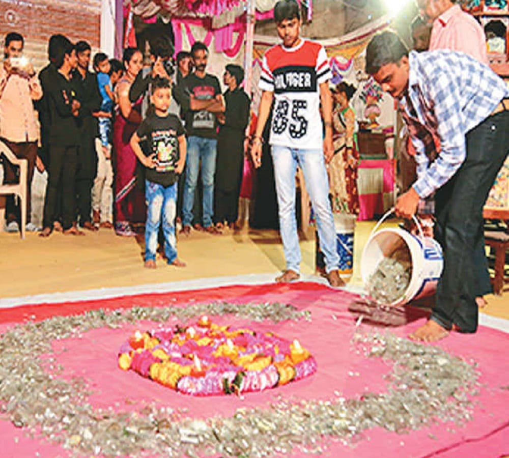 girls playing Garba on the pieces of glass at Durga ashtami in Junagarh