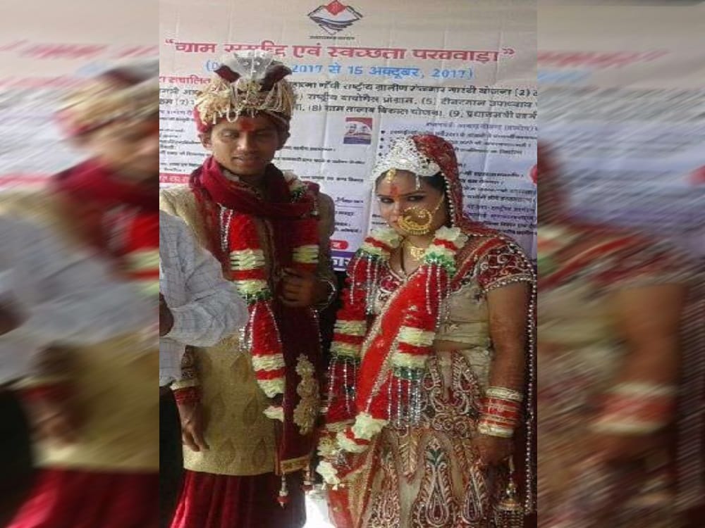Bride and groom clean village with family before marriage