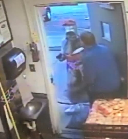 Man dressed in coca cola costume robs 500 doller in restaurant