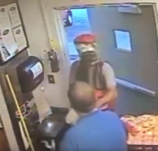 Man dressed in coca cola costume robs 500 doller in restaurant