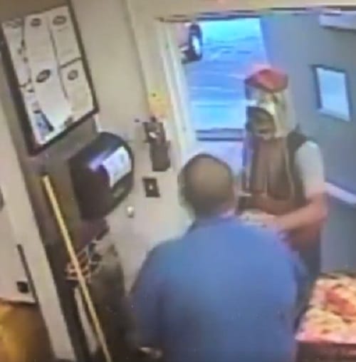 Man dressed in coca cola costume robs 500 doller in restaurant