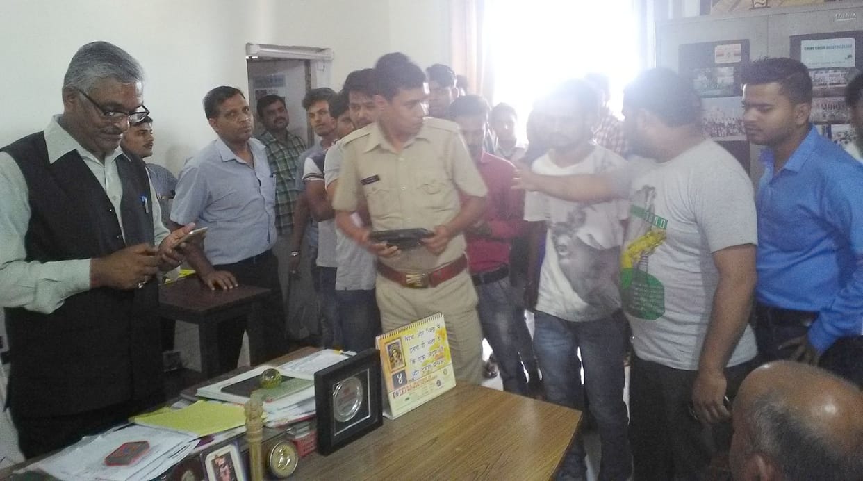 Students protest over checking