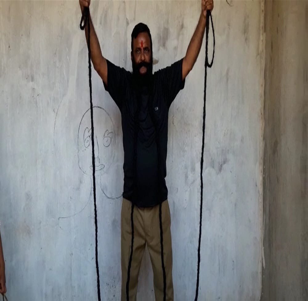 this man having 22 feet long moustache claimed to be the world record 