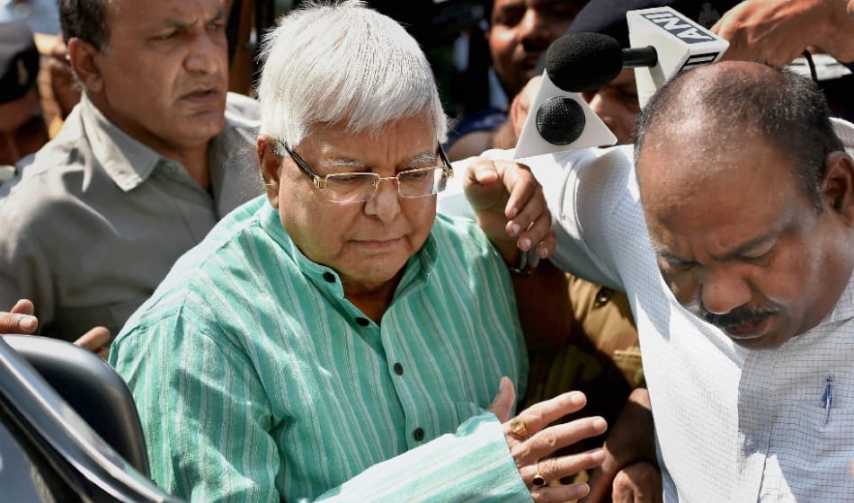 compulsion behind rjd chief Lalu prasad appearing before CBI for questioning in hotels for land scam