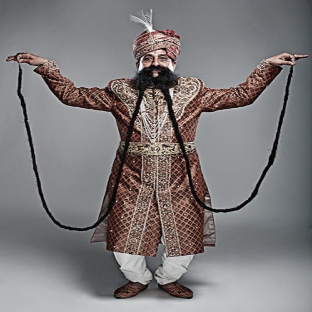 this man having 22 feet long moustache claimed to be the world record 