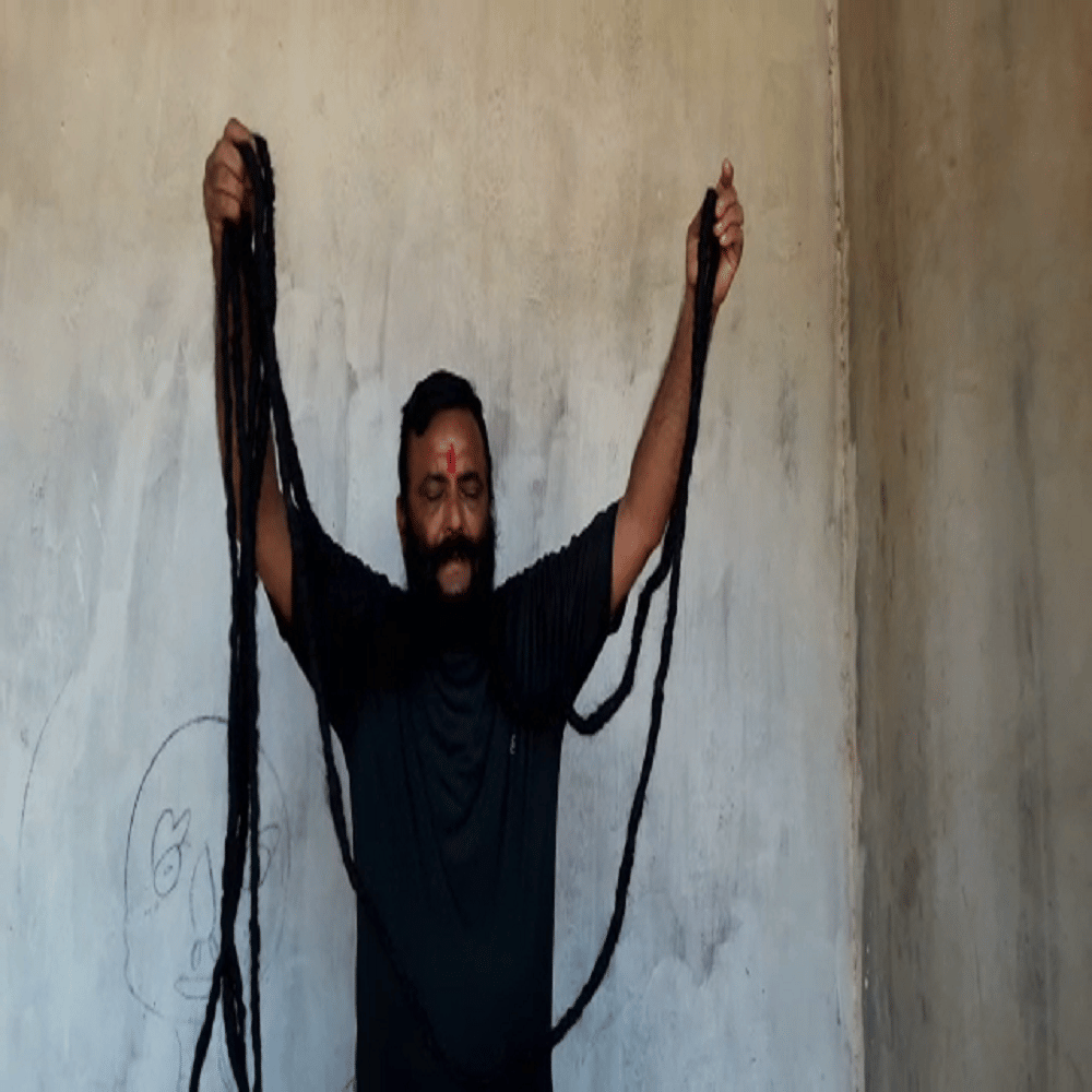 this man having 22 feet long moustache claimed to be the world record 