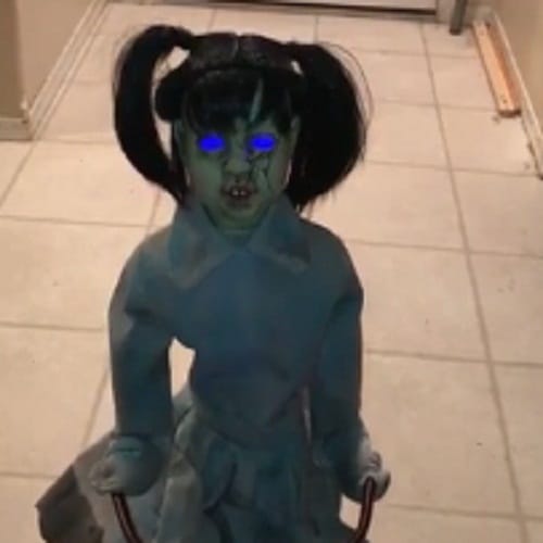 this blue eyes halloween doll makes you feel horrible 