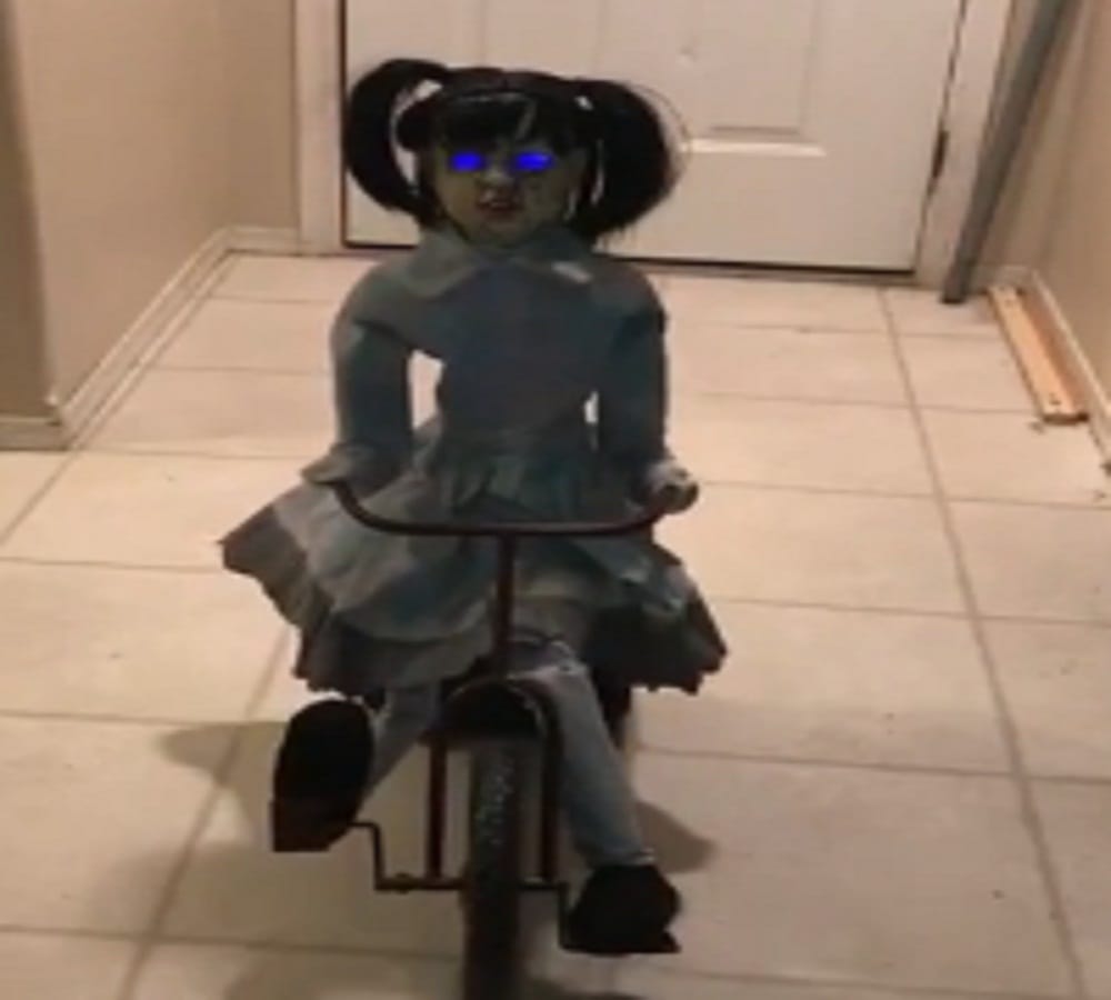 this blue eyes halloween doll makes you feel horrible 