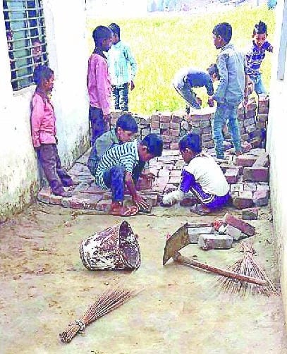 uple in the school room, child labour