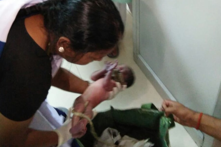 A new born baby girl found in a bag in Lucknow.
