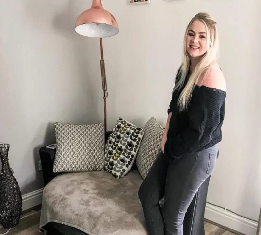 girl captured ghost sitting on the armchair  