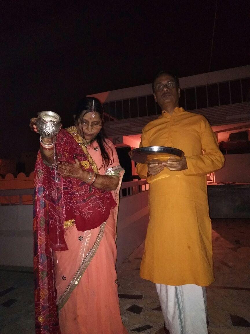 deputy chief minister dinesh sharma celebrates karwachauth with his wife.