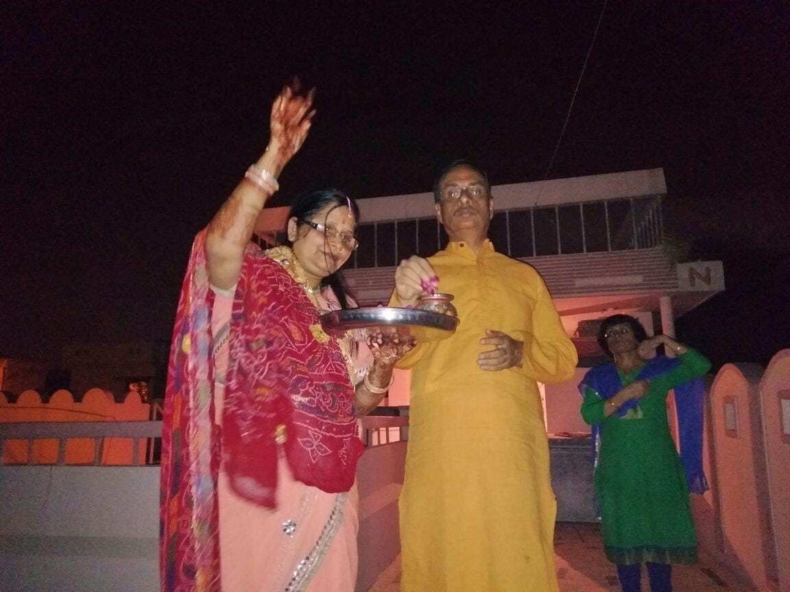 deputy chief minister dinesh sharma celebrates karwachauth with his wife.