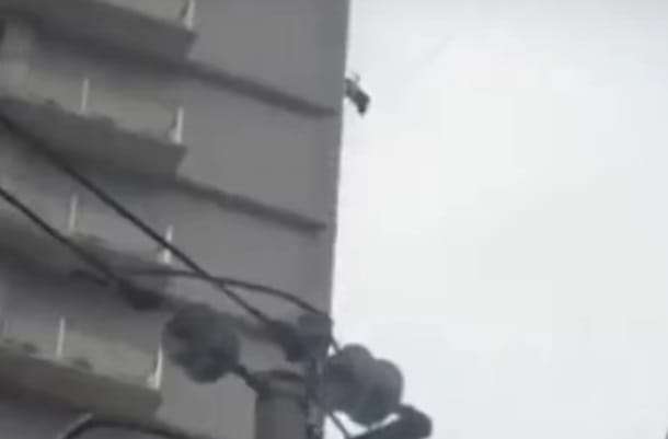 Watch video china man skip restaurant bill using telecome wire to get out from building