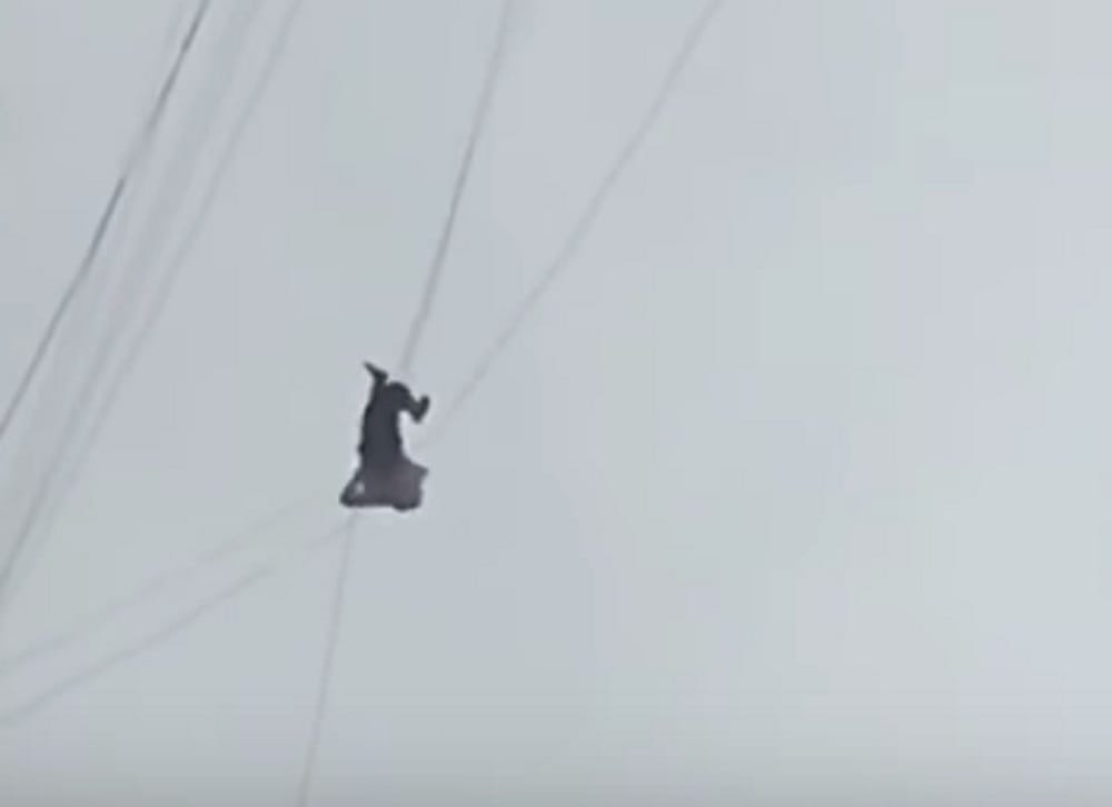 Watch video china man skip restaurant bill using telecome wire to get out from building