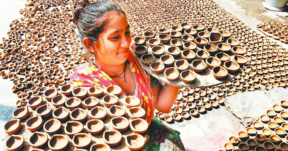 This Deeawali decorate your home with clay lamps beside chinese jhalar