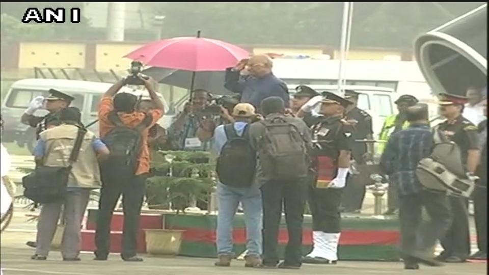 President Ram Nath Kovind takes salute amid pouring rain without umbrella in Kerala