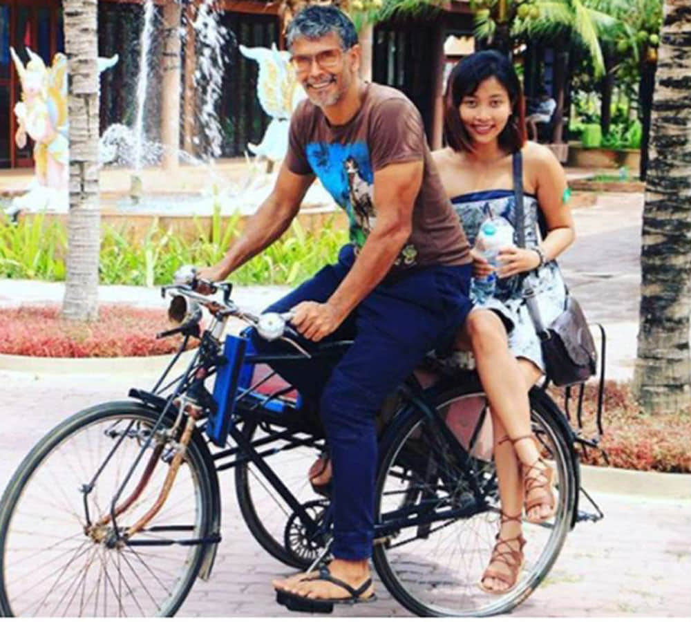 model milind soman and his girlfriend ankita konwar watch video