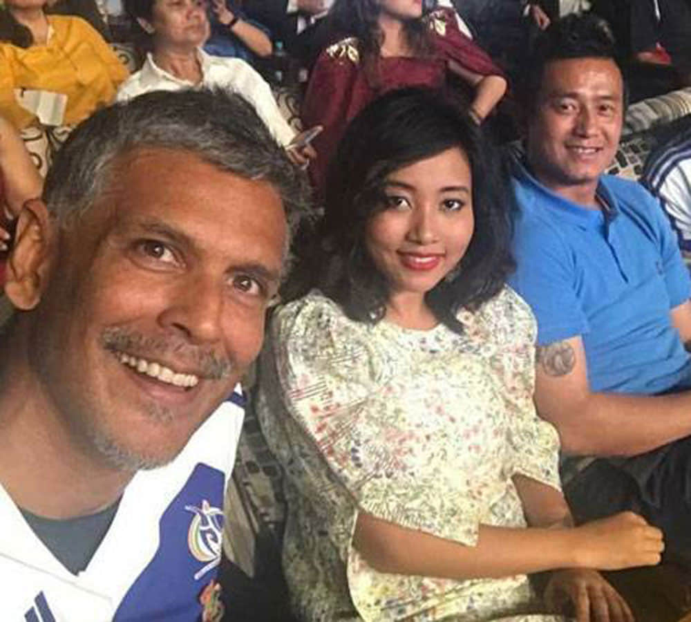 model milind soman and his girlfriend ankita konwar watch video