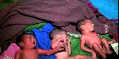 woman gave birth to three children in field