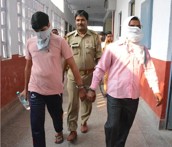 Life imprisonment for two including brother in murder