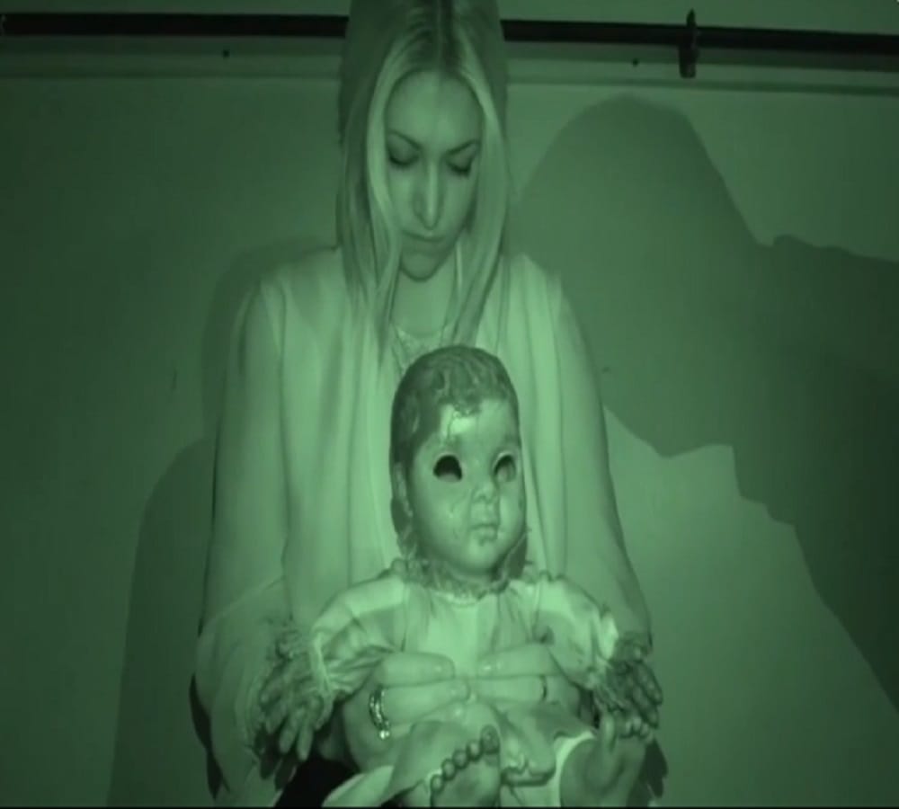 paranormal investigator throws across room by possessed wife