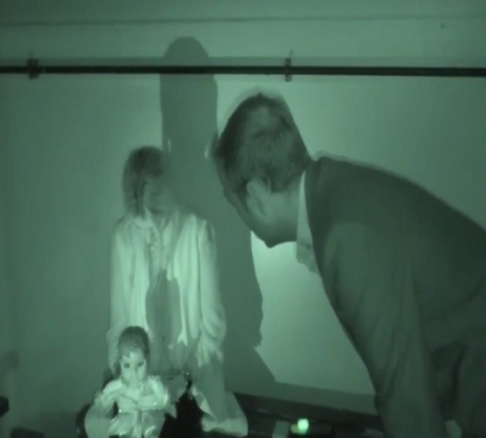 paranormal investigator throws across room by possessed wife