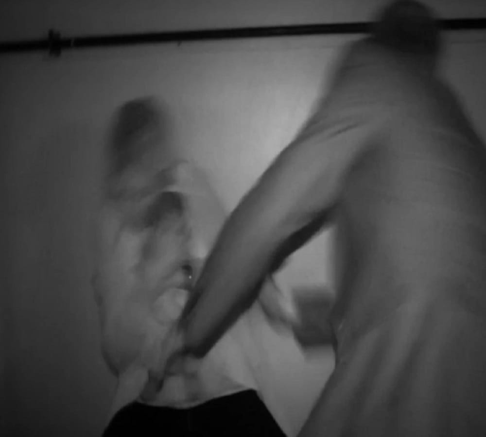 paranormal investigator throws across room by possessed wife
