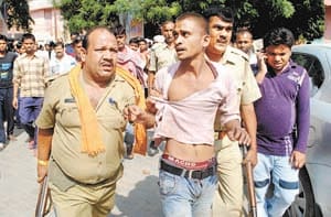 youth arrested doing fraud in bank