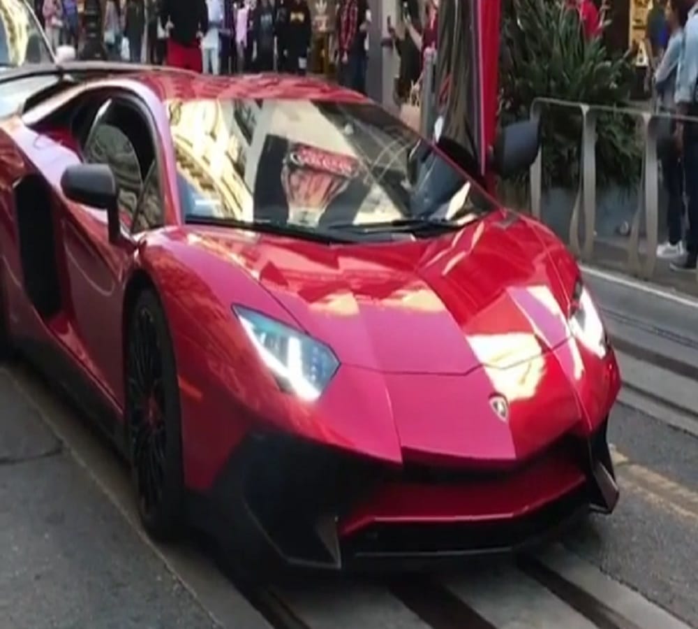 man jumps on three crore car video goes viral on internet 