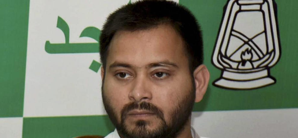 tejashwi yadav targets nitish kumar after it declared he is not doing promotion in gujarat for JDU
