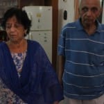 नोएडा सेक्टर 25 जलवायु विहार में  अरुषि के नाना नानी मिठाई खिलाते हुए।