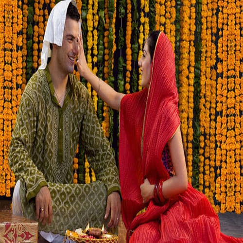  bhai dooj 2017: age increases if brother eating  with sister hand