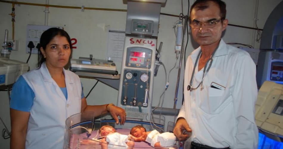 new born girl child thrown in plot by mother