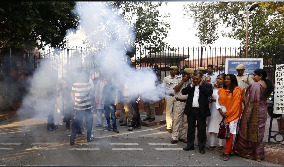 fourteen members of azad hind fauj burnt firecrackers outside the supreme court
