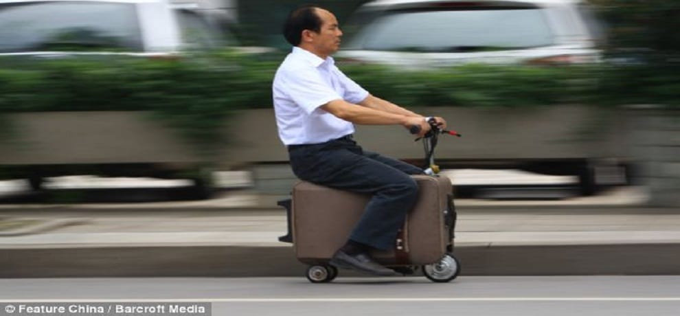 Eccentric inventor builds his own electric suitcase on wheels 