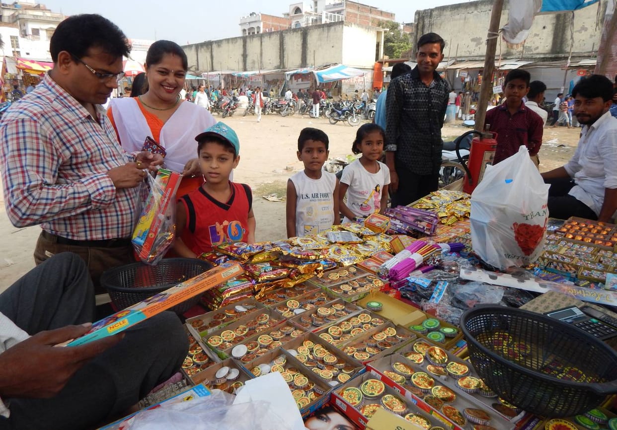 Marketers of firecrackers, crowd of buyers