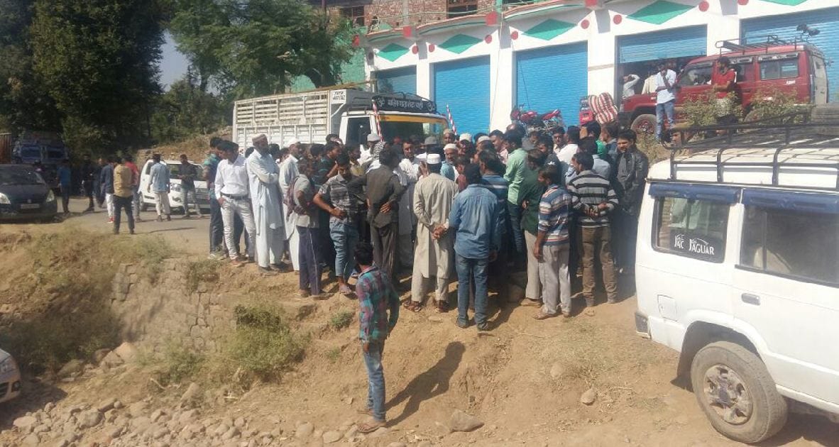 angery villagers block the road for the problem of light