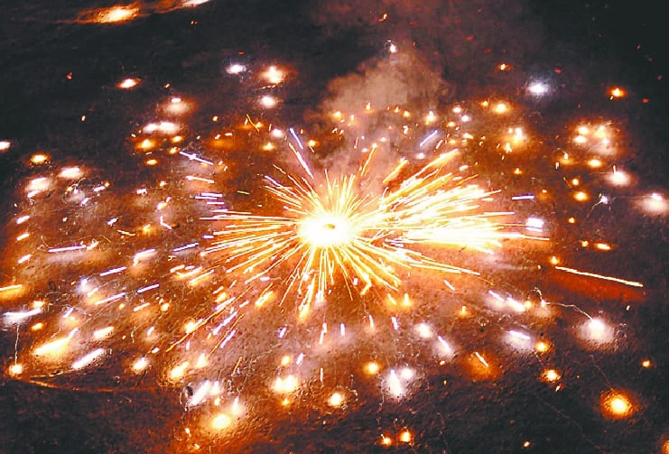 House shining with colorful light in Saharanpur, festive fireworks